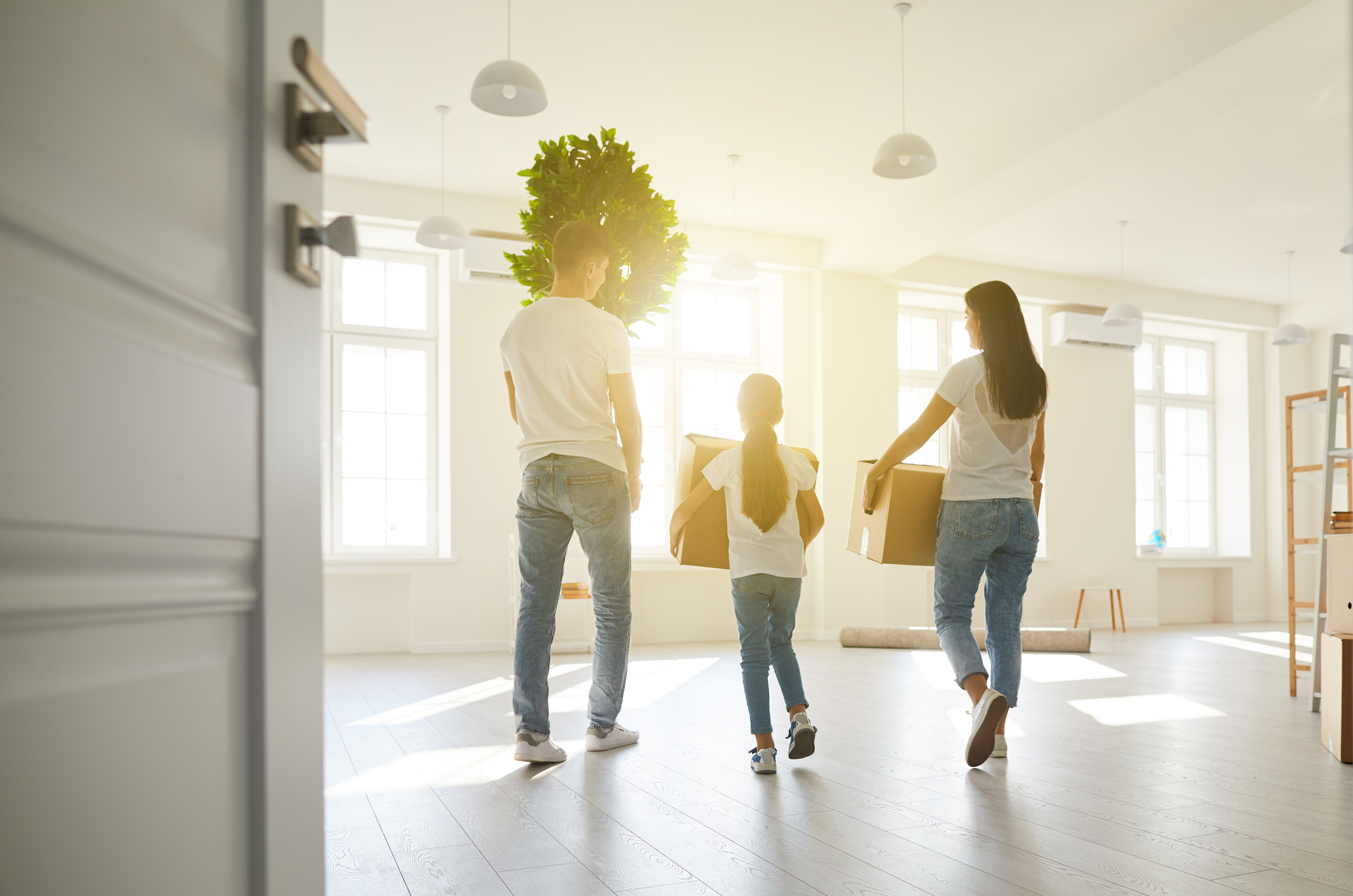 Family moving into their new build home.