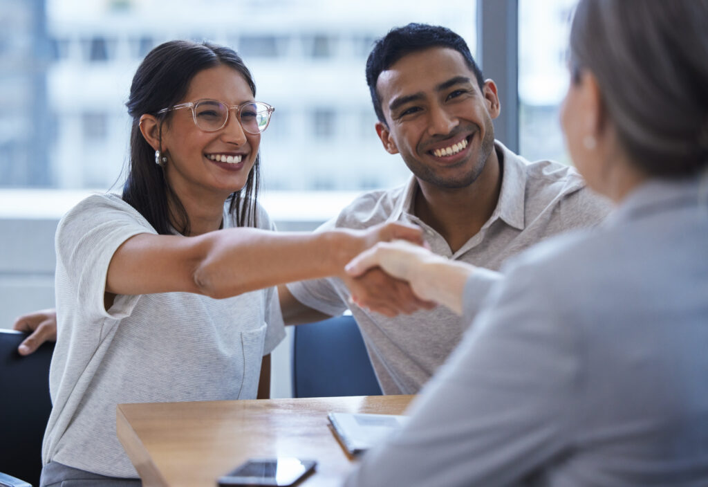 Couple getting financial advice from their financial adviser.